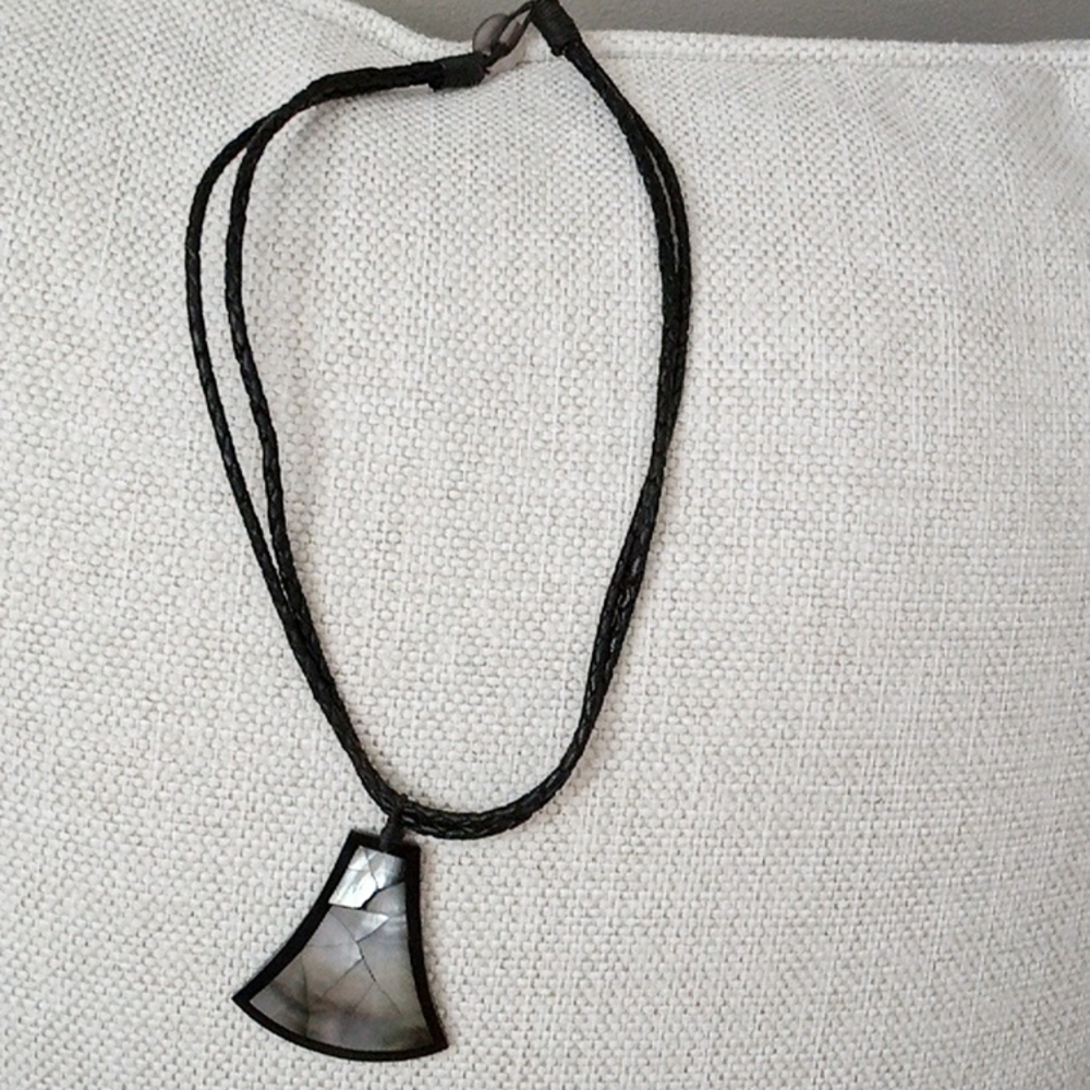 I am selling a necklace that's a black rope necklace.
